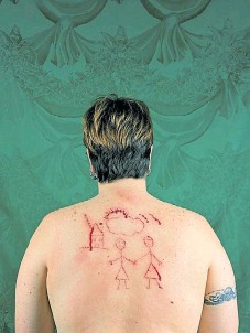 17. Catherine Opie, “Self-Portrait/Cutting,” 1993